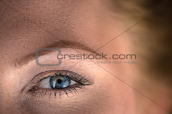 very close up eyes beautiful red-haired girl