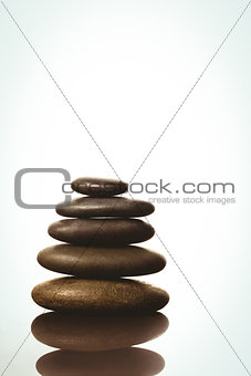 Zen stones balancing on white background
