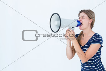 Woman shouting through a loudspeaker
