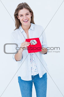 Happy woman opening a present