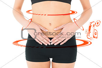Composite image of closeup mid section of a fit woman with stomach pain