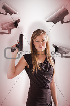 Composite image of femme fatale pointing gun up