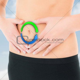 Composite image of closeup mid section of a fit woman in black shorts
