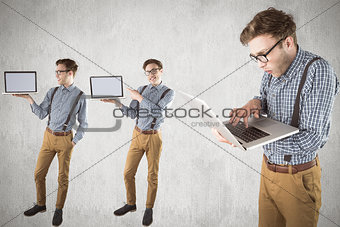 Composite image of nerd with laptop