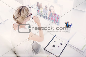 Composite image of female photo editor