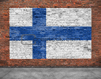 National flag of Finland painted on brick wall