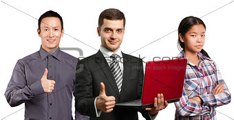 Asian team and male in suit with laptop in his hands