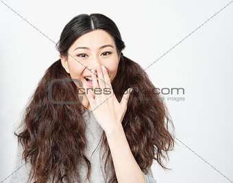 Astonished young chinese girl