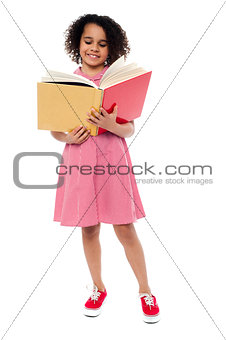 Child preparing for her examinations