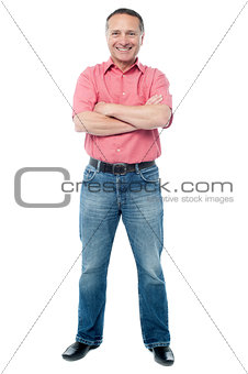 Casual aged man standing on white background