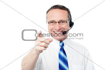 Mature business execuitve with headset