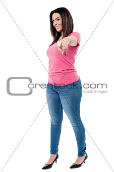 Attractive casual women pointing