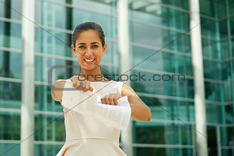 Young Business Woman Tears Pages Of Contract Smiling