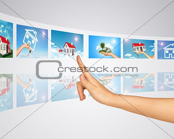 Subject homes for sale and rent. Finger presses one of virtual screens