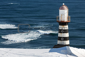 Lighthouse on coast of Pacific Ocean. Petropavlovsk-Kamchatsky