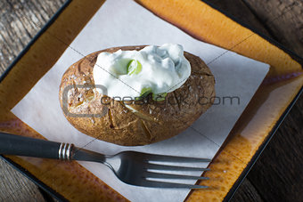 Baked Potato with Yoghurt and chive topping