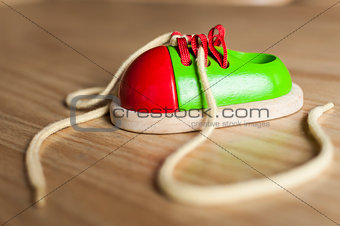 Ornamental wooden shoe toy