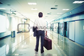 Businessman in airport ready to travel