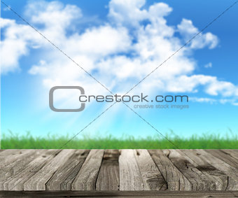 3D wooden table with grassy landscape