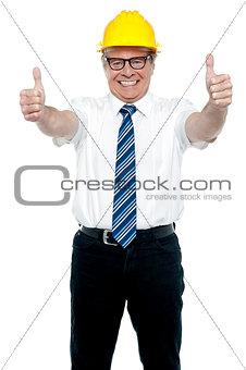 Business architect showing double thumbs up
