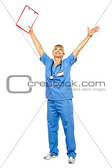 Long shot of a jubilant doctor celebrating her success