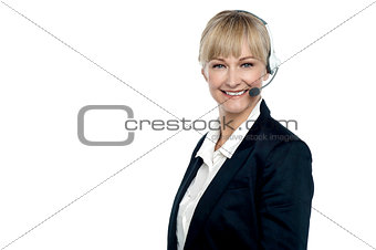 Corporate telecaller smiling confidently