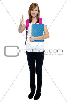 College going blonde showing thumbs up sign