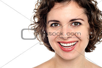 Bright smile of an attractive young woman