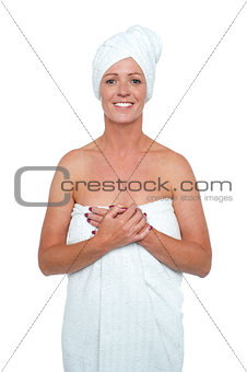 Sexy middle aged spa woman in white towel
