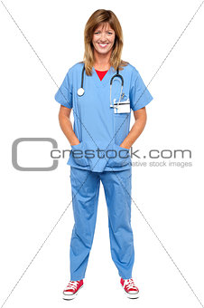 Lovely medical expert with hands in pocket