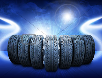Wedge of car wheels. Abstract blue background