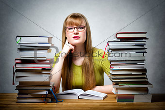 Famale Student with many books