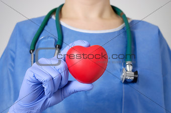 Heart in surgeon's hand