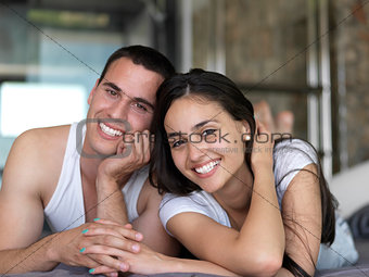 couple relax and have fun in bed