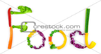 inscription food from pieces of vegetables on white background