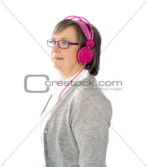 Aged female listening to music
