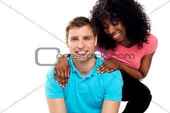 Attractive teenage love couple posing