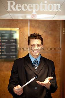 Young man holding an invoice