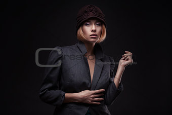 Elegant blond retro woman in hat
