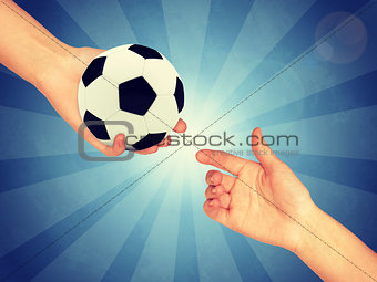 Soccer ball in hand