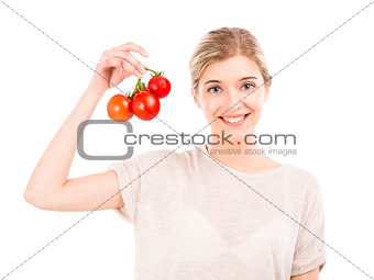 Beaitiful woman holding red tomatos
