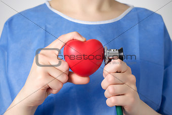 Doctor examining a heart