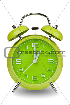 Green alarm clock with hands at 1 am or pm