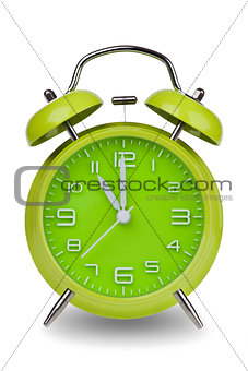 Green alarm clock with hands at 11 am or pm