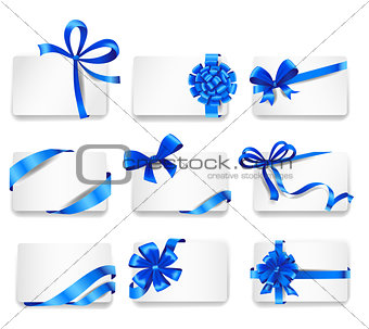 Set of beautiful cards with blue gift bows.