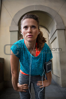 Fitness woman catching breathe