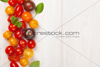 Colorful cherry tomatoes and basil