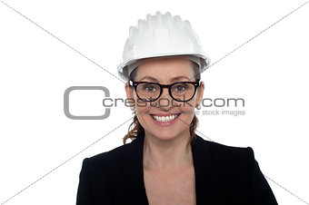 Portrait of a bespectacled female architect