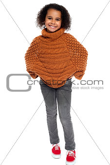 Portrait of lovely kid girl wearing winter clothing
