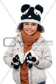 Portrait of a lovely little girl in winter outfit